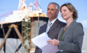 Construction professionals reviewing plans